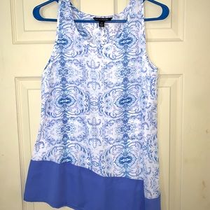 Asymmetrical hem sleeveless blouse